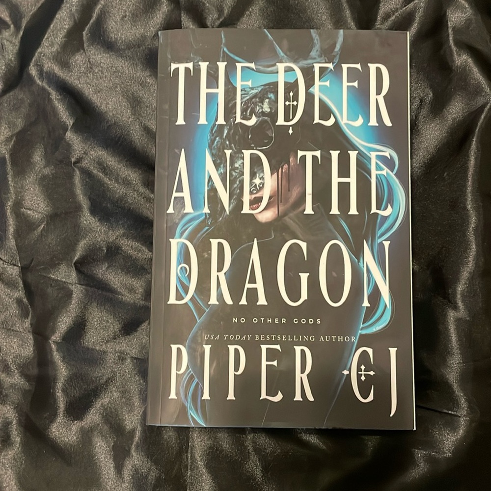 The deer and the dragon by piper c.j